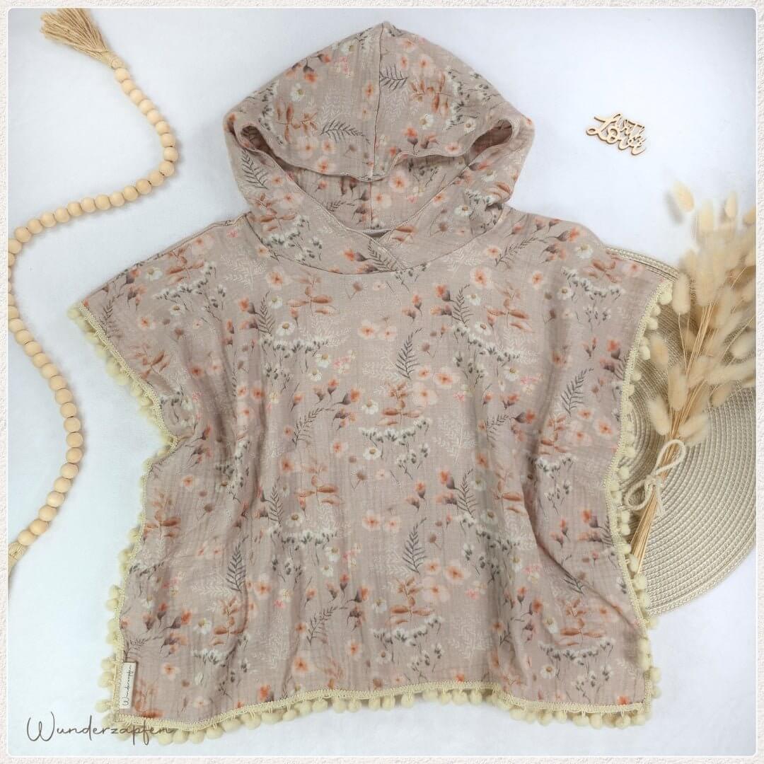 Badeponcho *Blumen* mit Pompomborte Creme - Wunderzapfen -